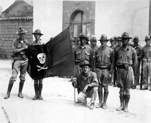 u.s._marines_holding_sandinos_flag_-_nicaragua_1932.jpg